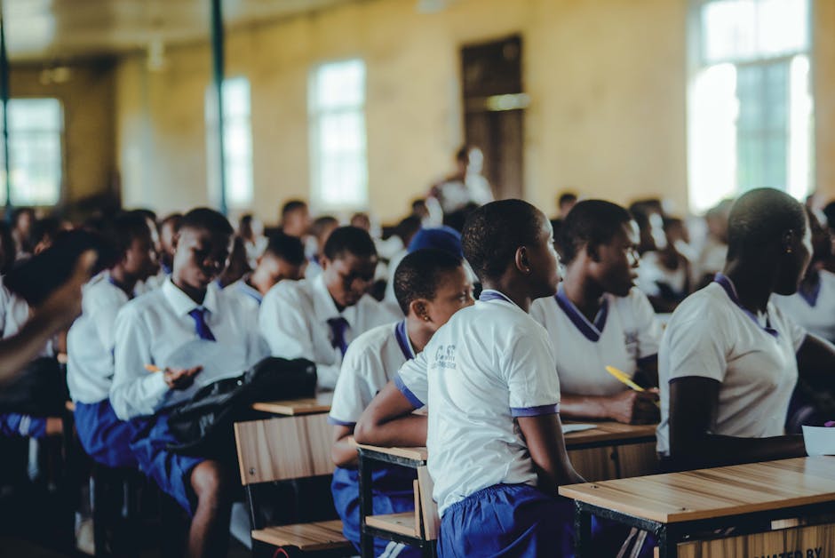 Students attentively engaged in a classroom setting, focusing on their studies