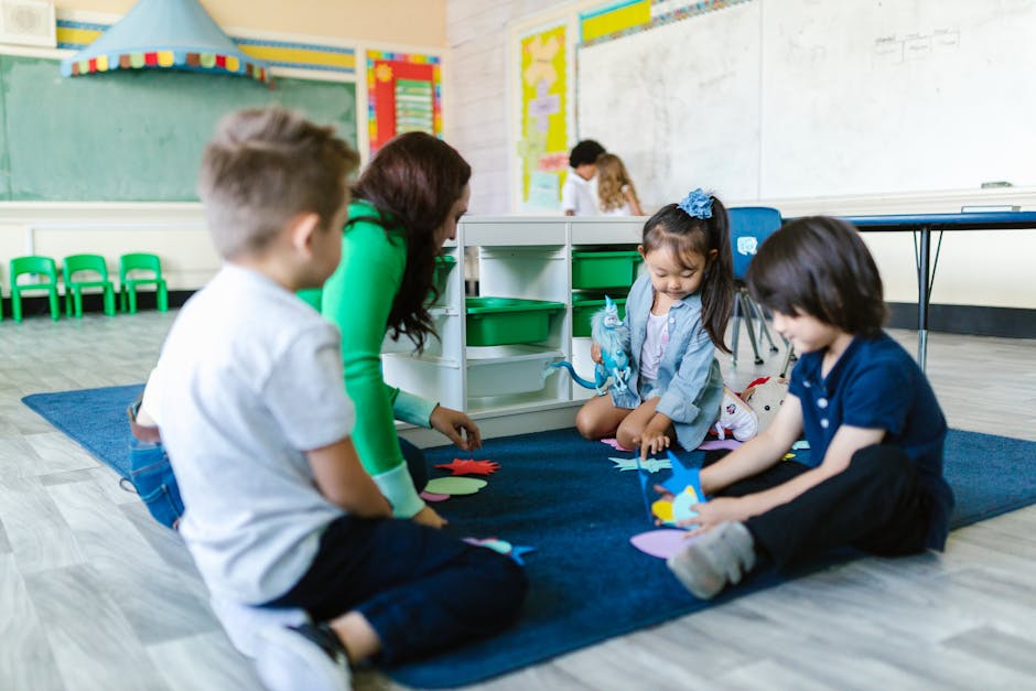 Kids and teacher in a kindergarten classroom engaging in creative play on the carpet